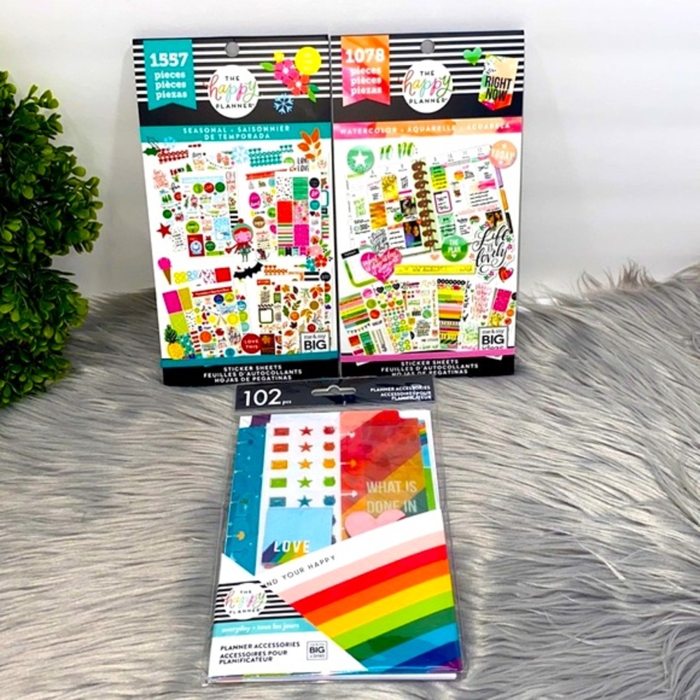 The happy planner sticker books and accessories